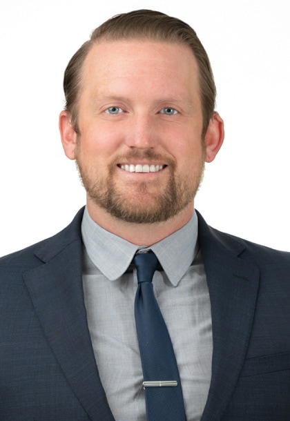 Portrait of Ryan Herold, Director of Sales at Eggs Unlimited, a key figure in driving sales strategies and fostering relationships with global clients in the egg industry.